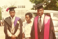 Geoffrey with parents at Graduation